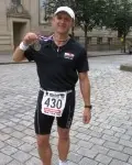 Auditel�s Ironman Alan Ford raises more than &pound;2,000 for Cancer Research